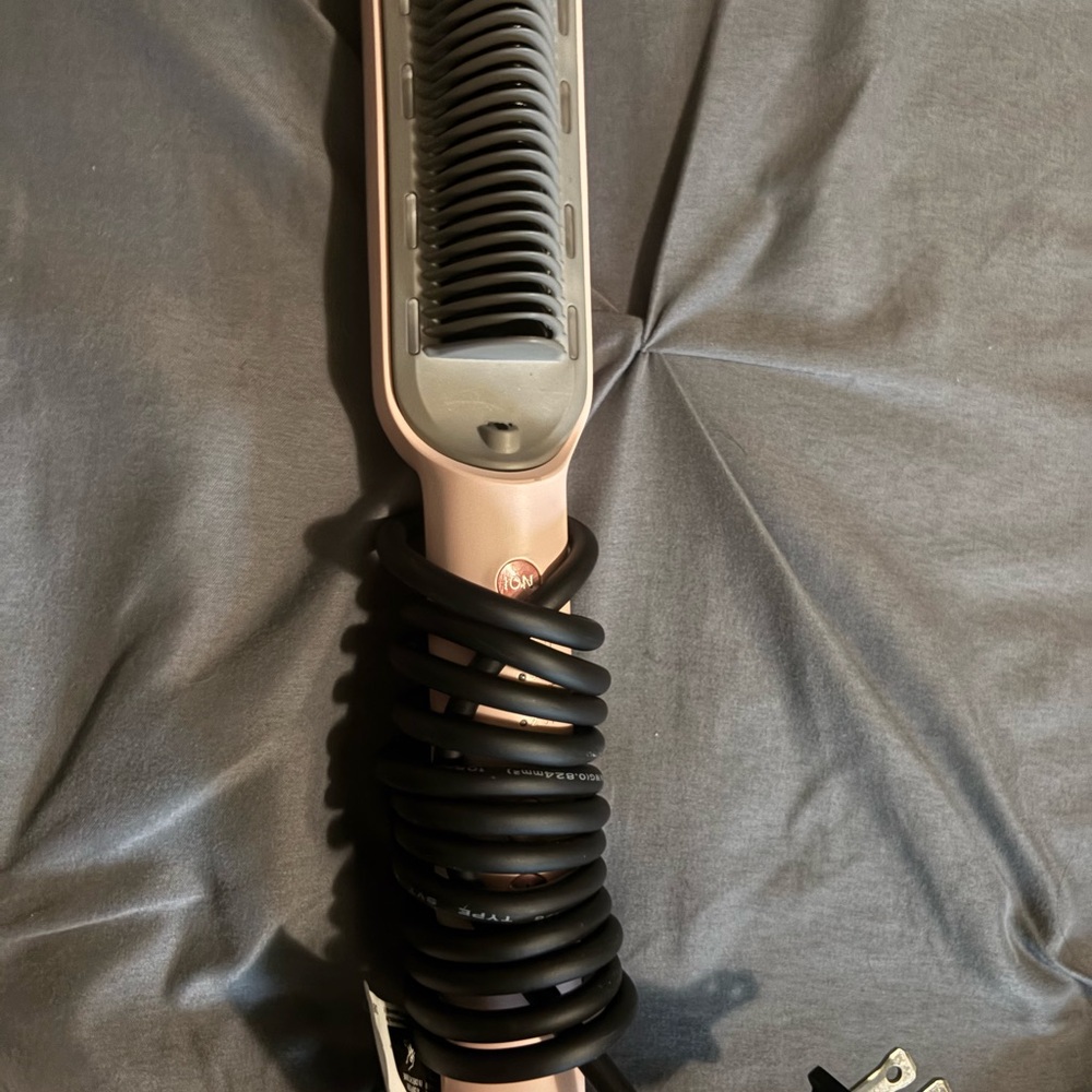 Sleek Pink Hair Straightening Brush